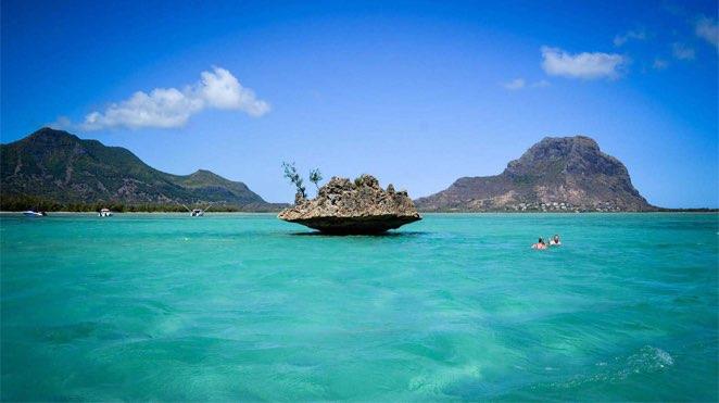 mauritius swimmers with ocean island