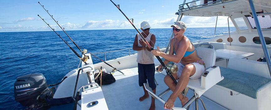 woman reeling in her catch
