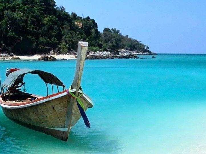 zanzibar traditional boat in the aqua indian ocean waters square